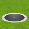 gray round inground trampoline