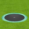 akrobat green round inground trampoline on grass