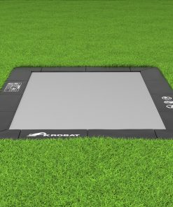 Worlds Best Trampolines 19 A tablet placed on lush grass, set against a backdrop of rich greenery, creating a peaceful and natural atmosphere.