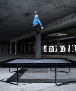 professional jumping on a 14 foot by 10 foot above ground trampoline