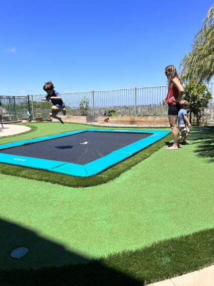 Alternative view of 10ft x 6ft Akrobat Primus Flat In-Ground Trampoline - Green Pad with Black Jump Mat