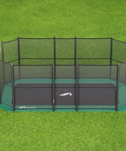 A small green trampoline placed on a grassy area, inviting outdoor fun and exercise.