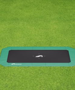 A black and green square trampoline set on a grassy area, inviting for outdoor fun and exercise.