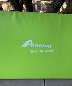 A sleek kobat golf bag cover designed to protect and enhance the appearance of golf bags during transport.