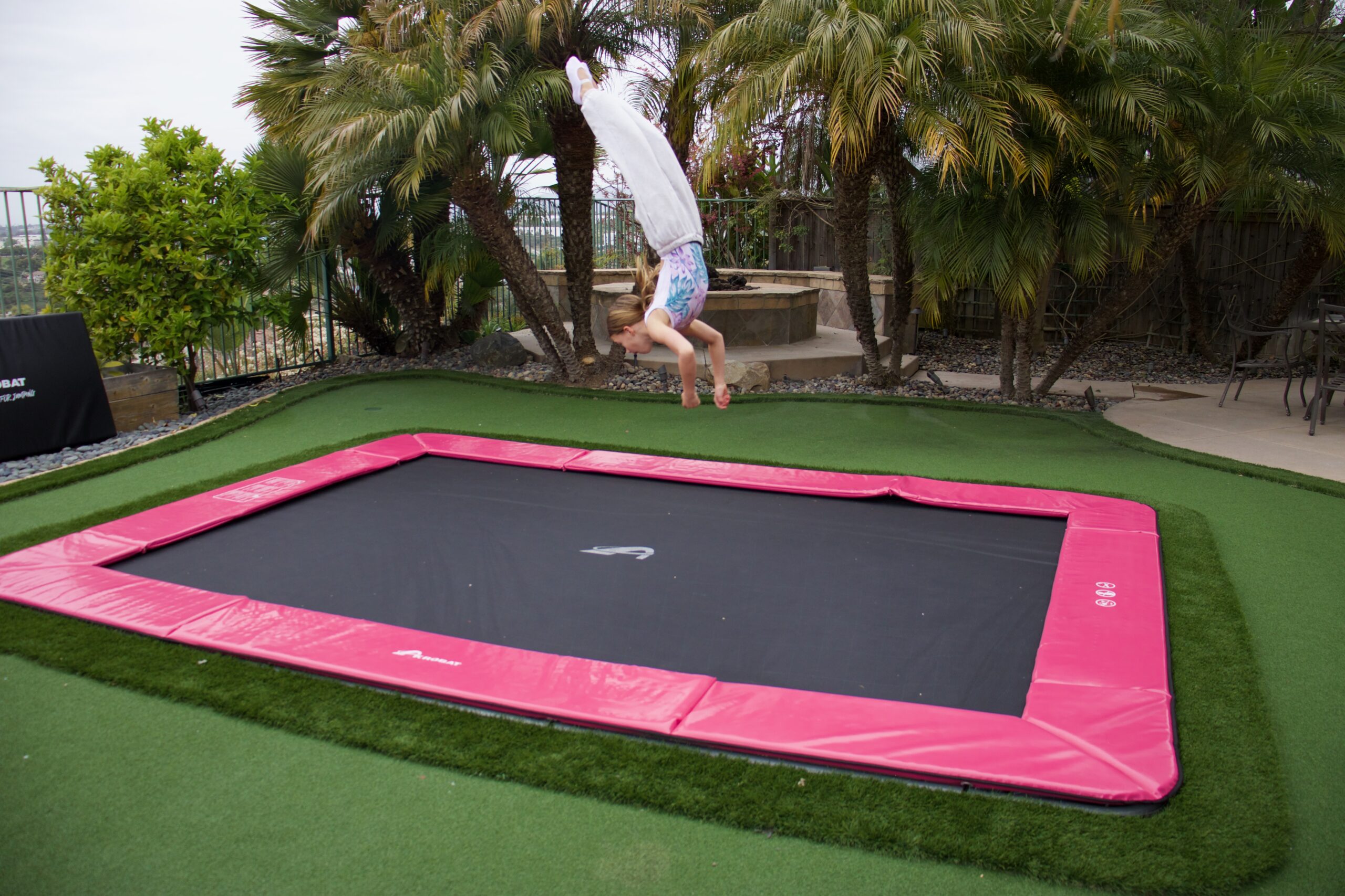 17ft x 10ft Akrobat Primus Flat PLUS LIMITED EDITION PINK PAD with Black Jump Mat In-ground Trampoline 4 17ft x 10ft Akrobat Primus Flat PLUS LIMITED EDITION PINK PAD with Black Jump Mat In-ground Trampoline - Image 4