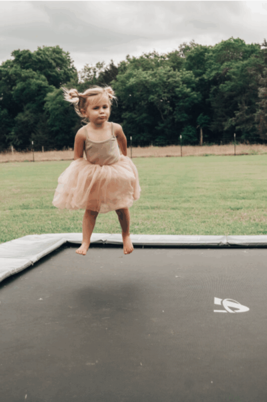 How Long Does It Really Take to Put Together a Trampoline? 2 girl jumping on rectangular trampoline